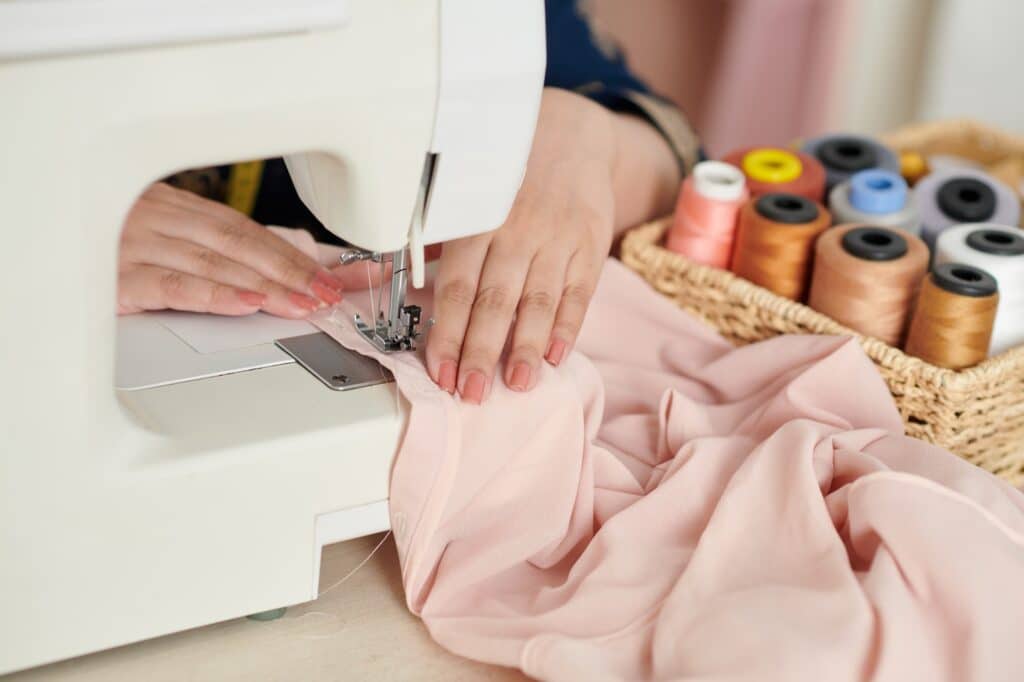 Dressmaker Sewing Silk Blouse